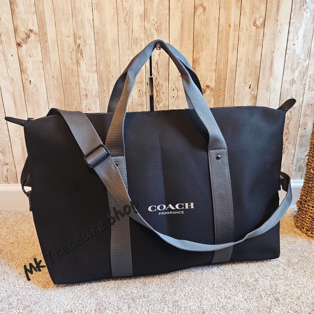 Coach black travel bag 14” tall, 23” wide, base/bottom 61/2”